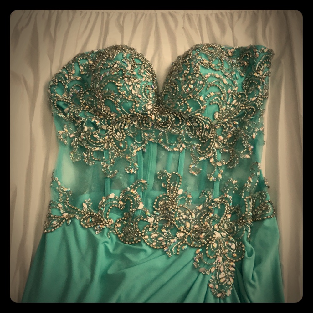 Never worn sequin teal long dress